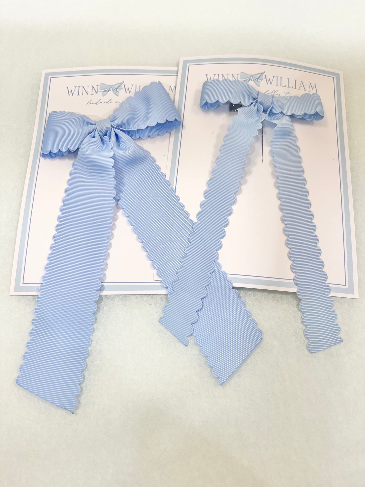 Scalloped Long-Tail Bow Pale Blue
